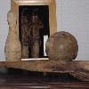 Wooden bowling ball and pins.